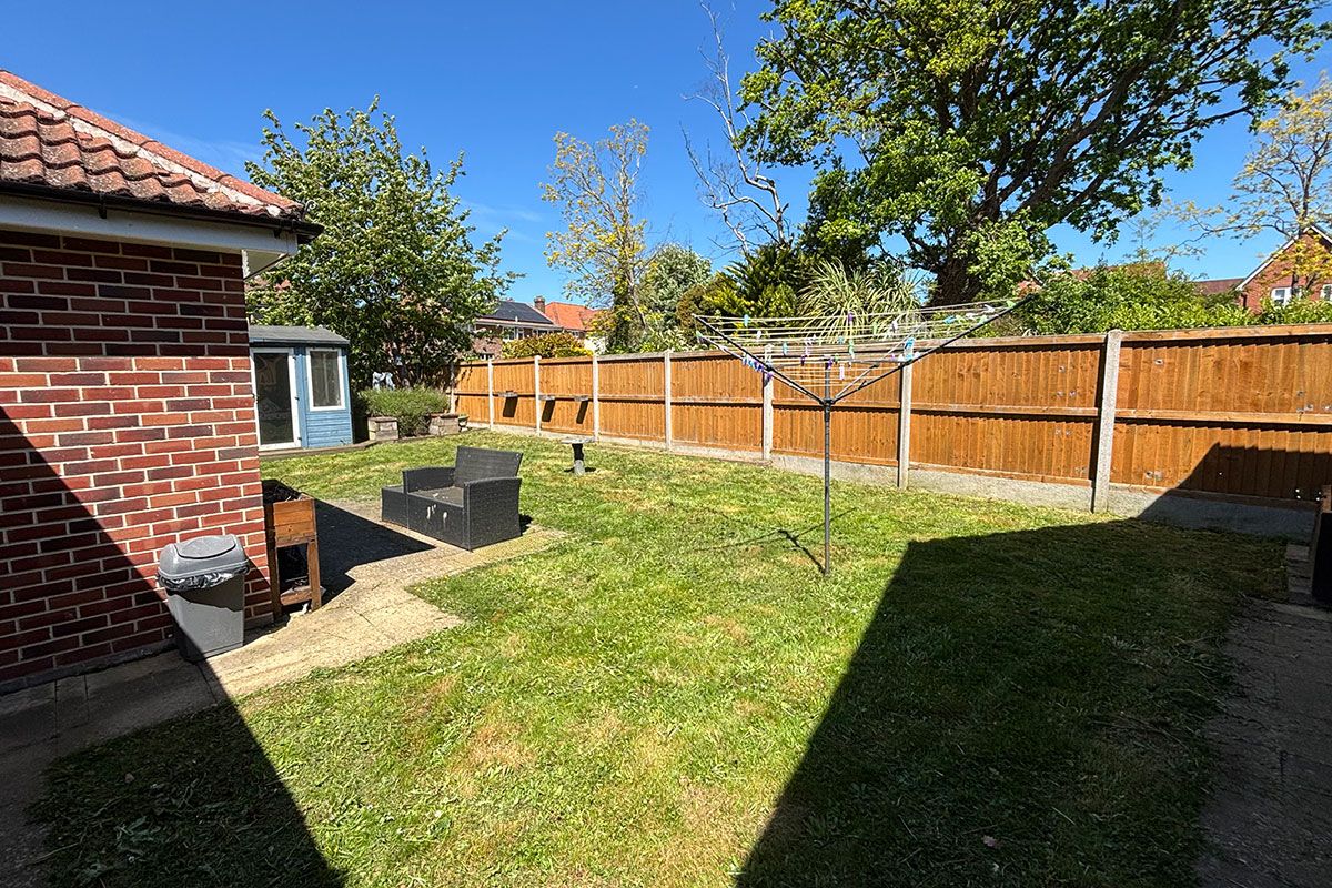 This is the after photo once Poop Patrol had completed their transformational garden rescue for a homeowner suffering a debilitating back injury allowing the garden to become overgrown and unmanageable in terms of her dog's waste.